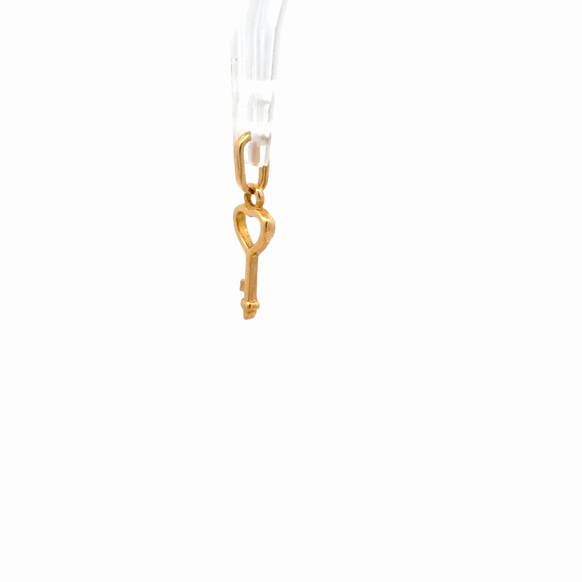 Dije llave en oro