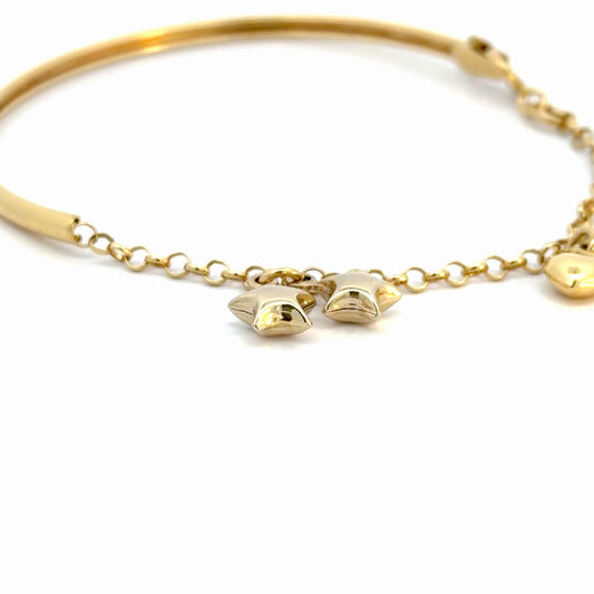 Pulsera en oro con dijes colgantes