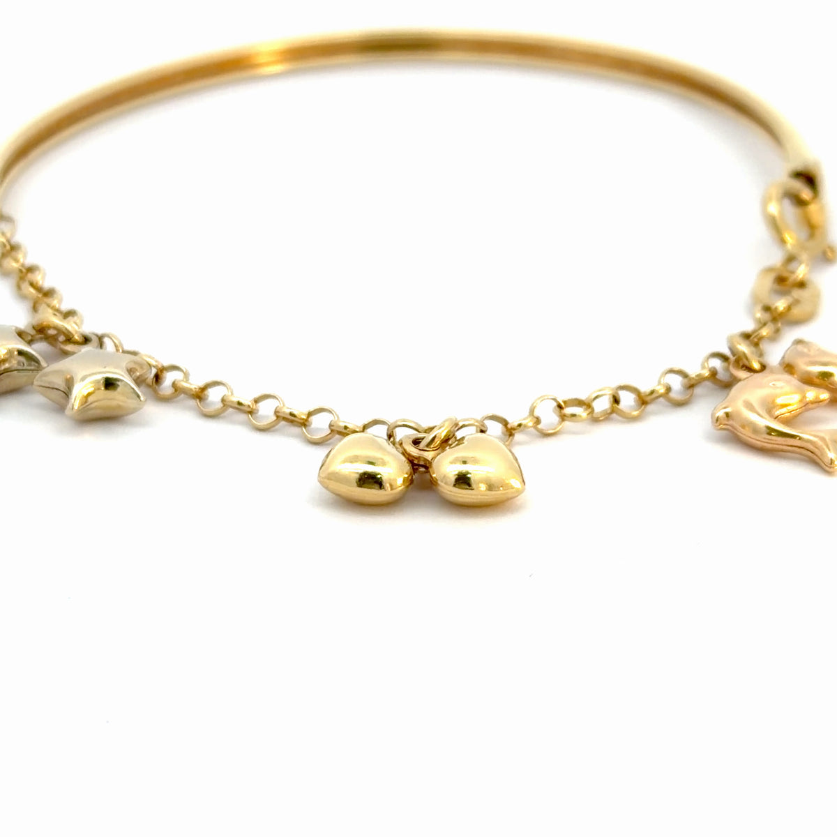 Pulsera en oro con dijes colgantes