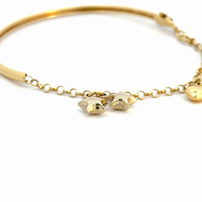 Pulsera en oro con dijes colgantes