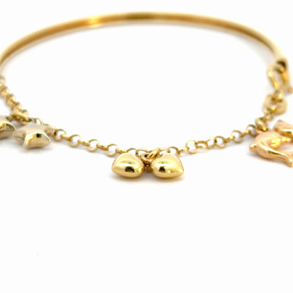 Pulsera en oro con dijes colgantes
