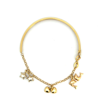 Pulsera en oro con dijes colgantes
