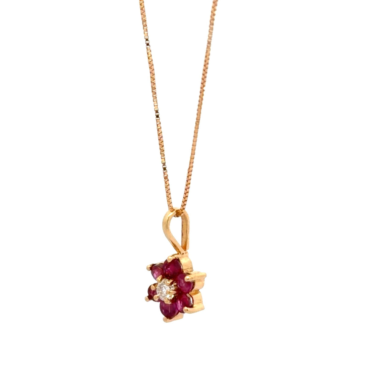 Dije flor en rubíes y diamante