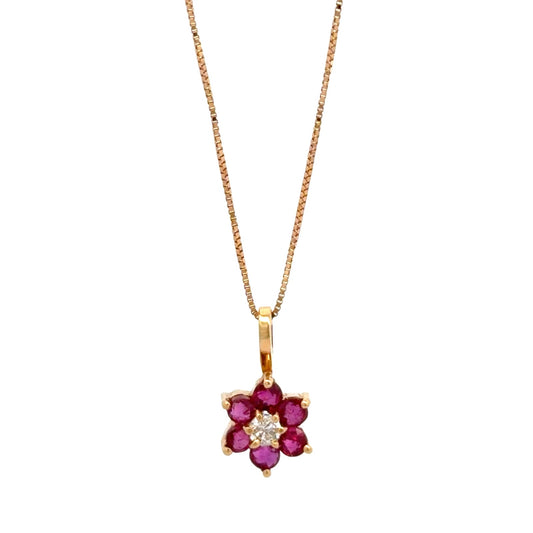 Dije flor en rubíes y diamante