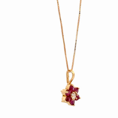 Dije flor en rubíes y diamante