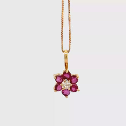 Dije flor en rubíes y diamante