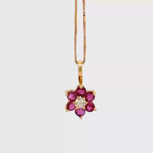 Dije flor en rubíes y diamante