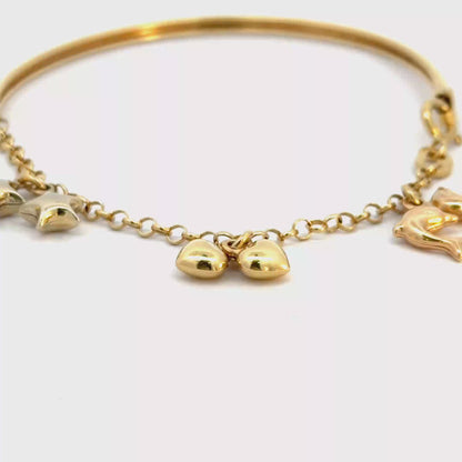 Pulsera en oro con dijes colgantes